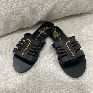 Ancient Greek Sandals x Ilias Lalaounis Black and Gold Slide Sandals